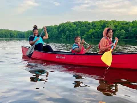 a group of people in a canoe