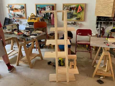 a person painting in a room