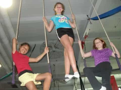 a group of people on ropes