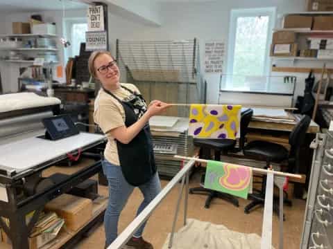 a person holding a kite