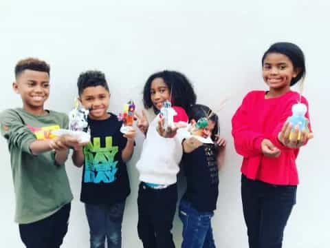 a group of people holding toys