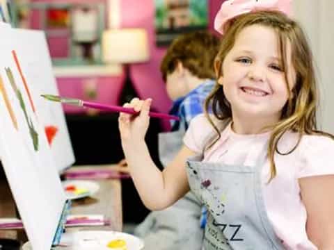 a girl with a pink bow