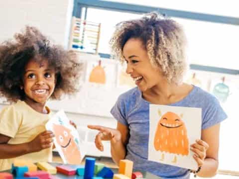 a few young girls painting
