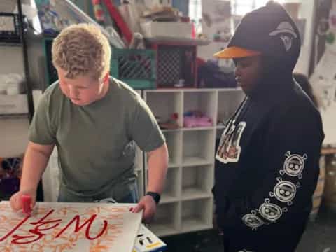a couple of boys in a store