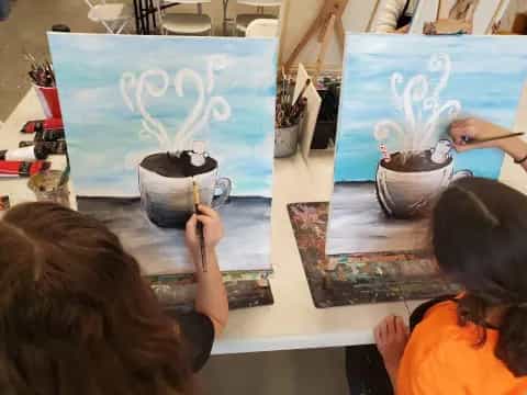 children drawing on paper