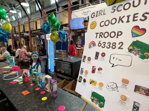 a store with a sign and toys