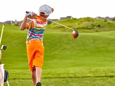 a person playing golf