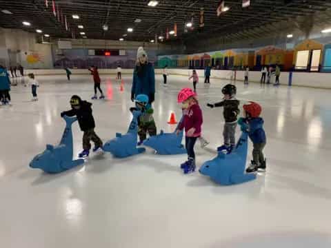 a group of people on an ice rink