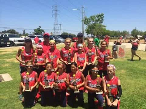 a group of people wearing red shirts