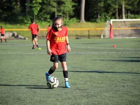a girl playing football