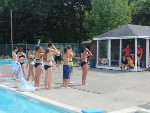 a group of people in a pool