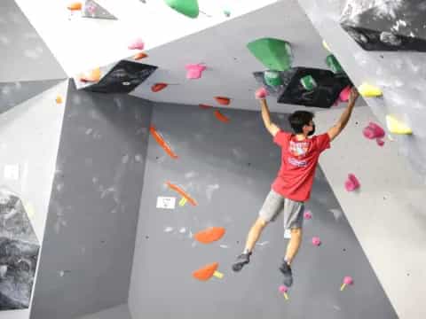a person climbing a rock wall