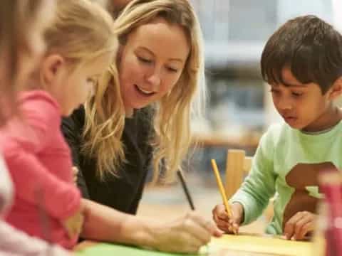 a woman and a couple of children