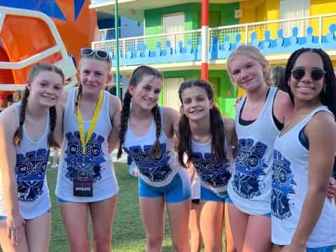 a group of women in athletic wear