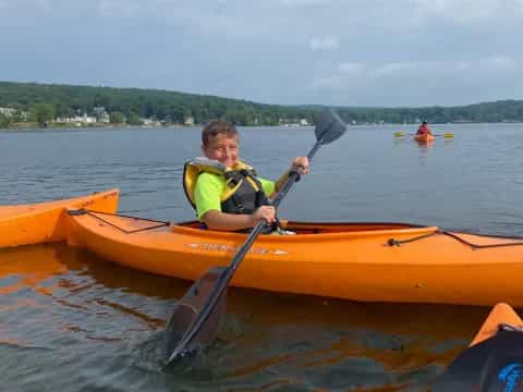 a boy in a kayak