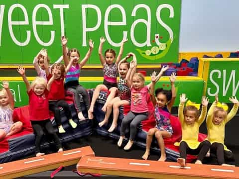 a group of children posing for a photo