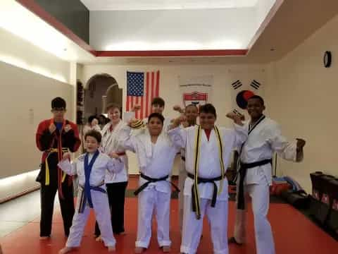 a group of people in karate uniforms