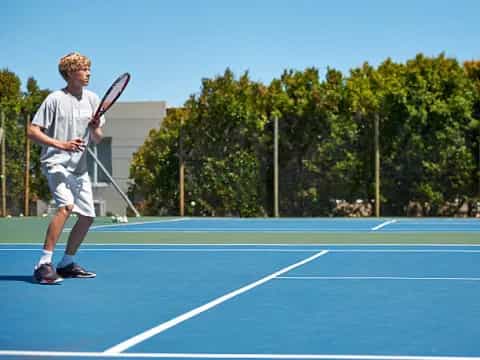 a man playing tennis