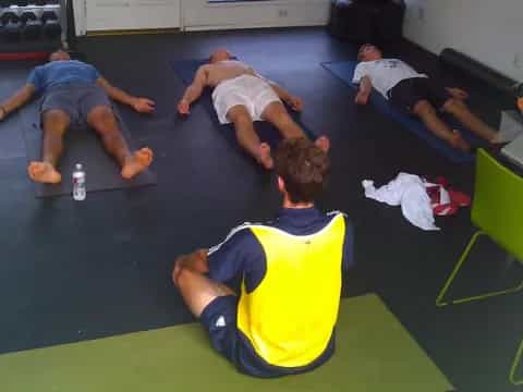 a group of people lying on the floor