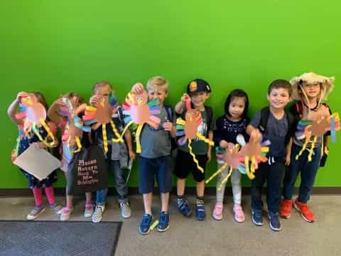 a group of children posing for a photo