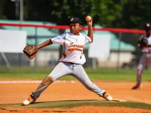 a baseball player throwing a ball