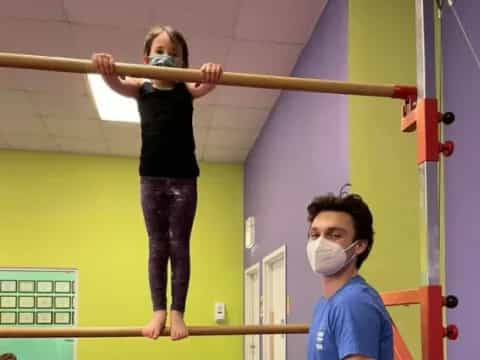 a person standing on a bar