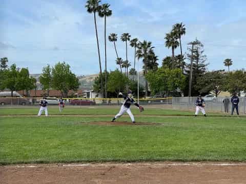 a baseball player throwing a ball