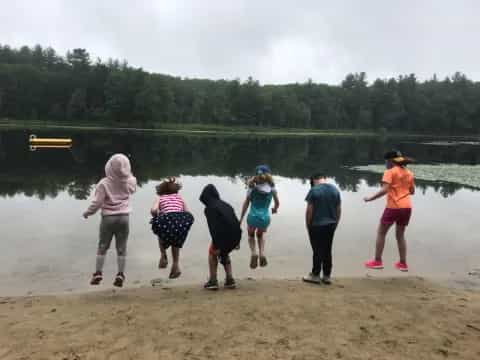 a group of people on a beach