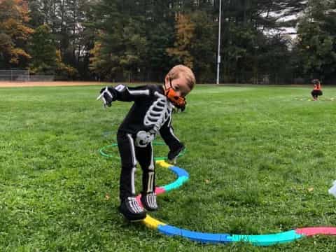 a boy playing with a kite