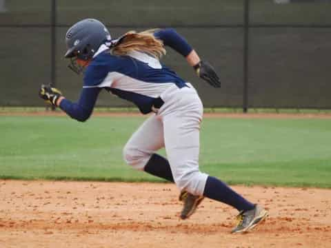 a person throwing a baseball