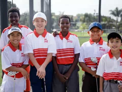 a group of boys in sports uniforms