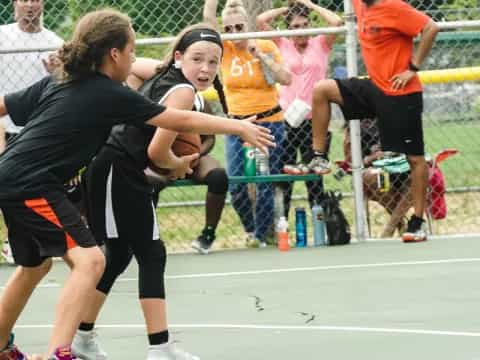 a group of people playing a sport