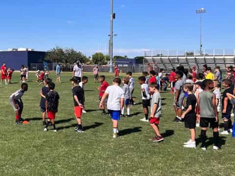 a group of people on a field