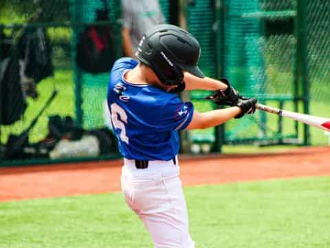 a young boy playing baseball