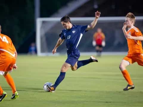 a group of men playing football