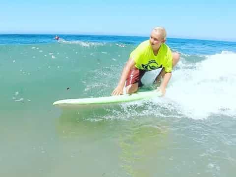 a man surfing on the waves