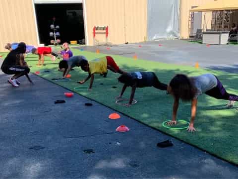 a group of people doing yoga