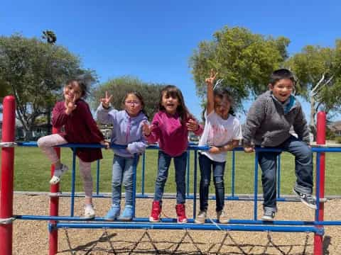 a group of people posing for a photo