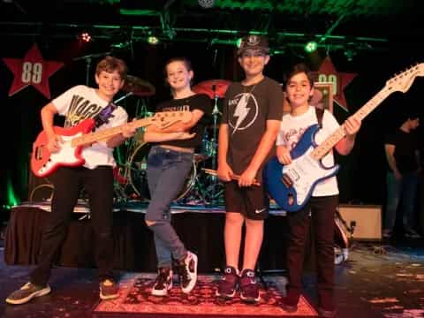 a group of people holding guitars