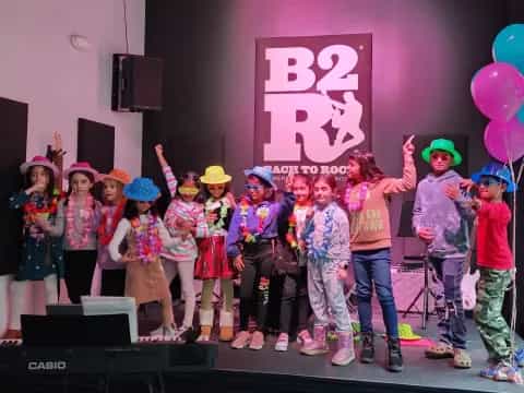 a group of children on a stage