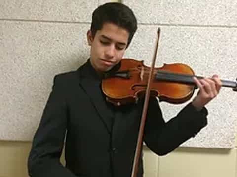 a person playing a violin