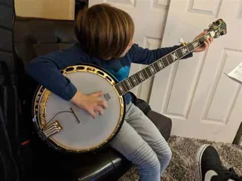 a person playing a guitar