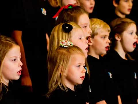 a group of children in a row
