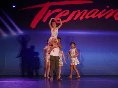 a group of people on a stage