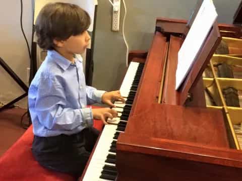 a child playing a piano