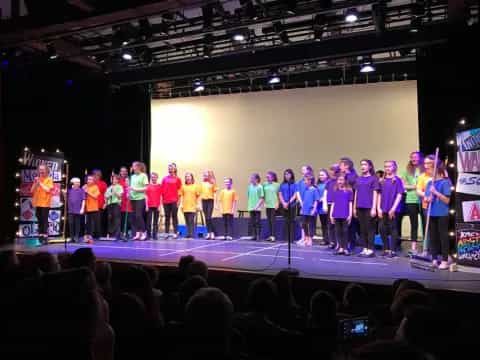 a group of people on a stage