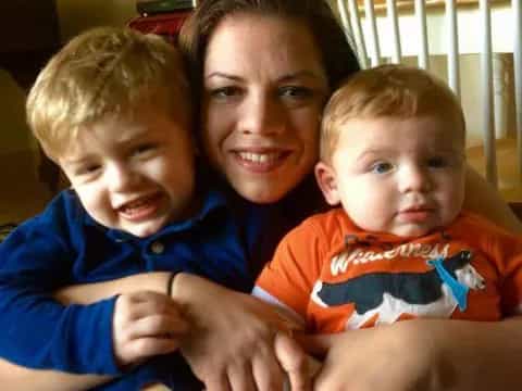 a person and two boys