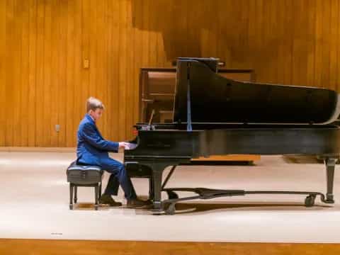 a person playing a piano