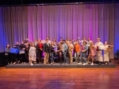 a group of people on a stage