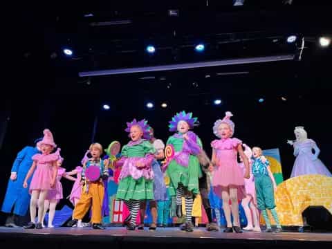 a group of children on a stage